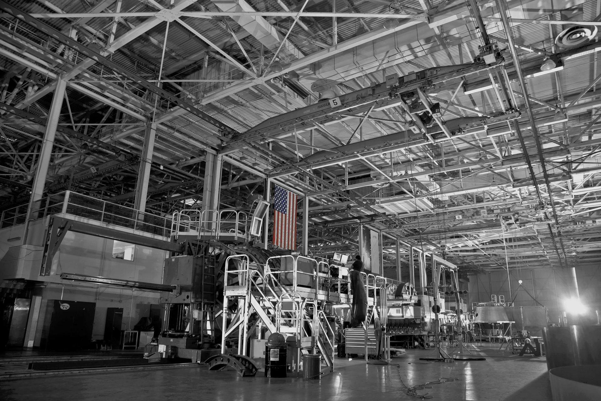 American flag hanging in industrial futuristic factory