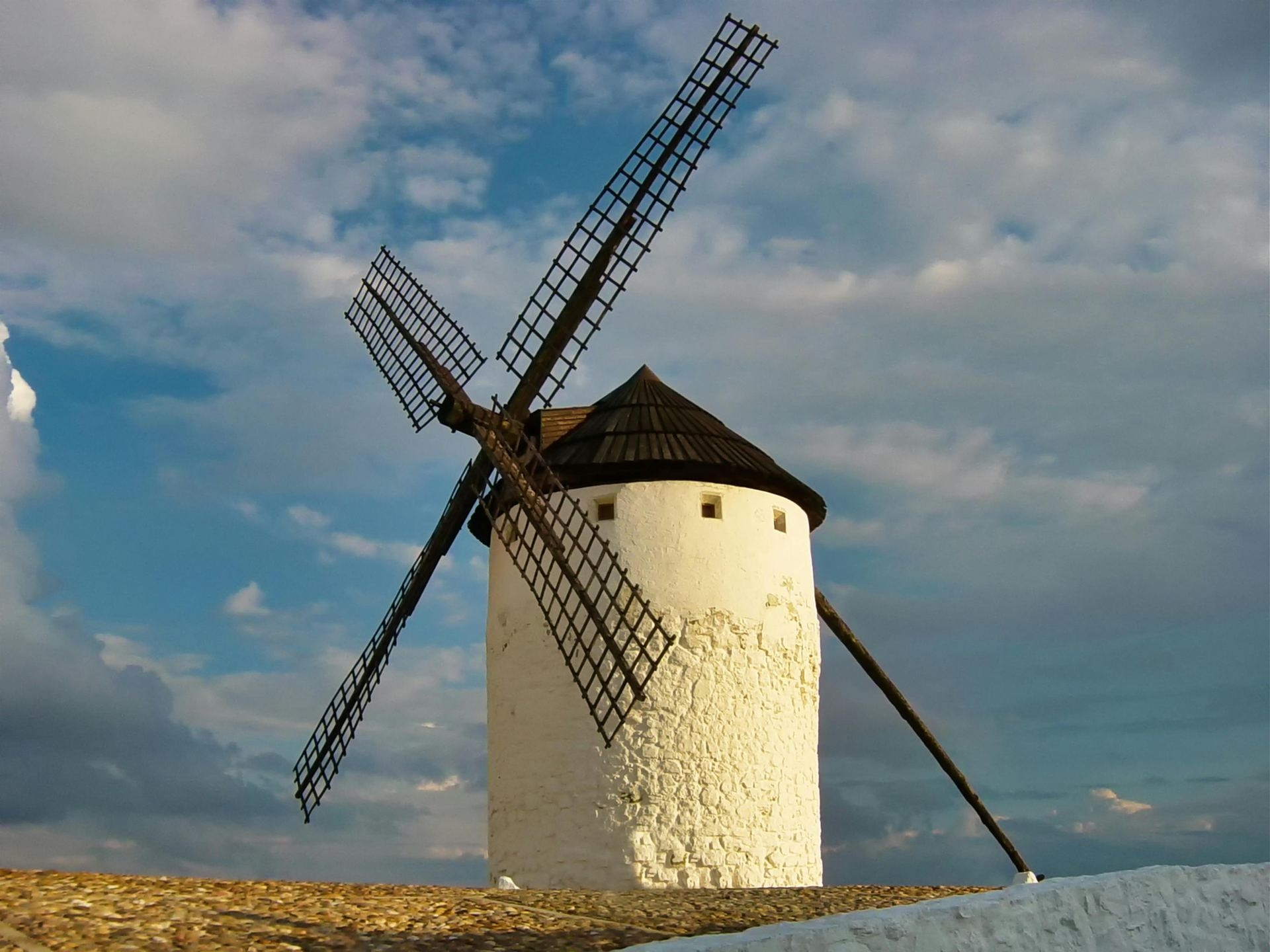 A Windmill Under Blue Sky