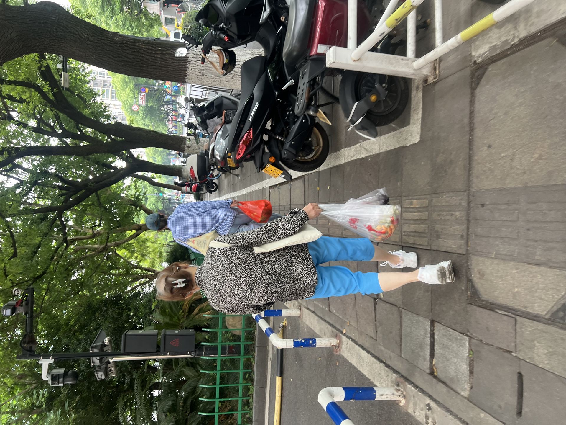 Sidewalk Pedestrians in Central Hangzhou