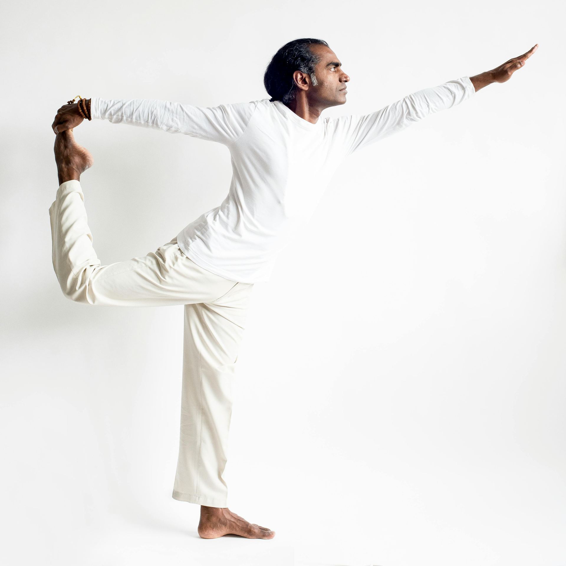 Man Wearing White Clothes Meditating